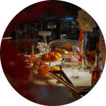 Boho-inspired outdoor wedding table with neutral linens and wildflowers